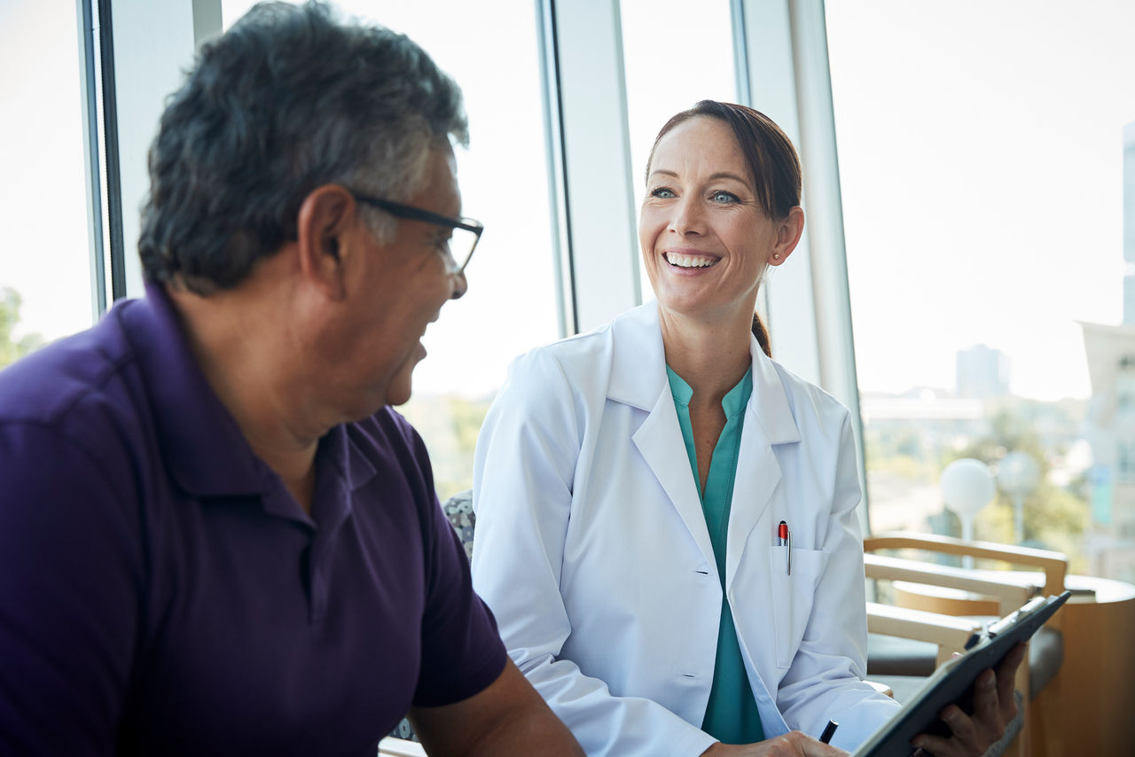 Doctor speaking with male patient